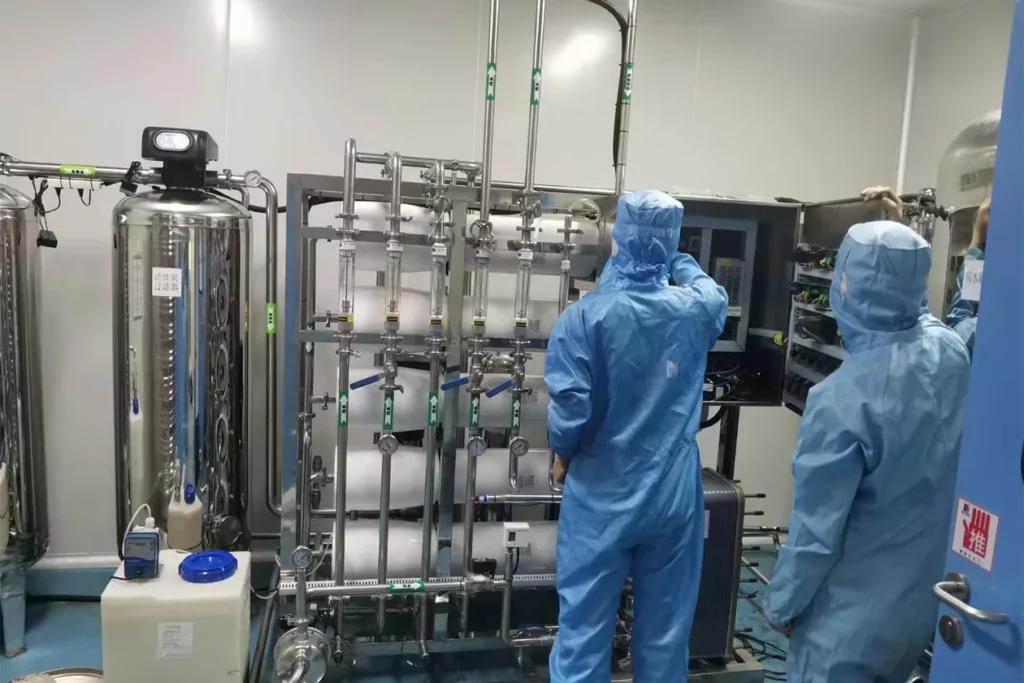 Workers doing maintaince for water deionizer system